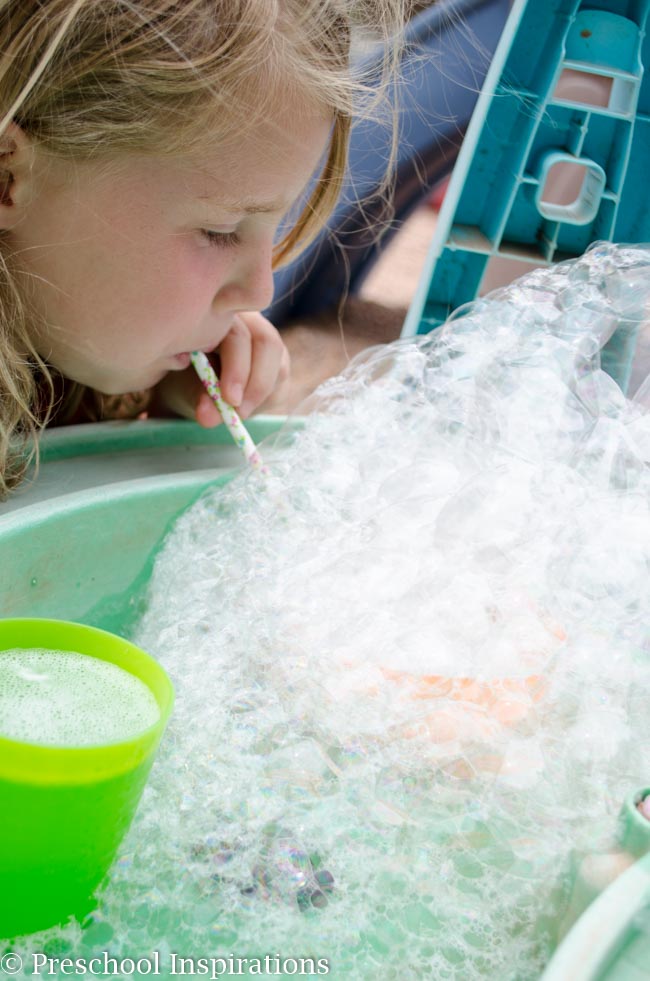 This is a perfect outdoor sensory experience. Let children make bubbles with a bubble blowing sensory table.