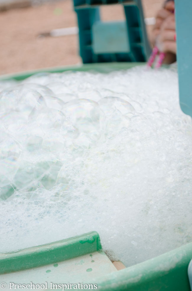 Let children make bubbles to their heart's content in this bubble blowing sensory table-8