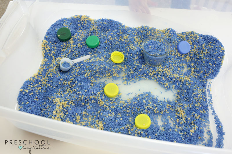 This contains an image of: Easy to Make Night Sky Sensory Bin