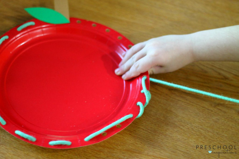 This apple lacing activity works on fine motor skills