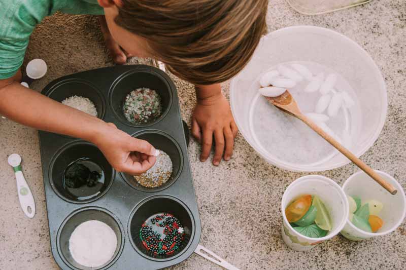 Sensory play with Muffin Tin