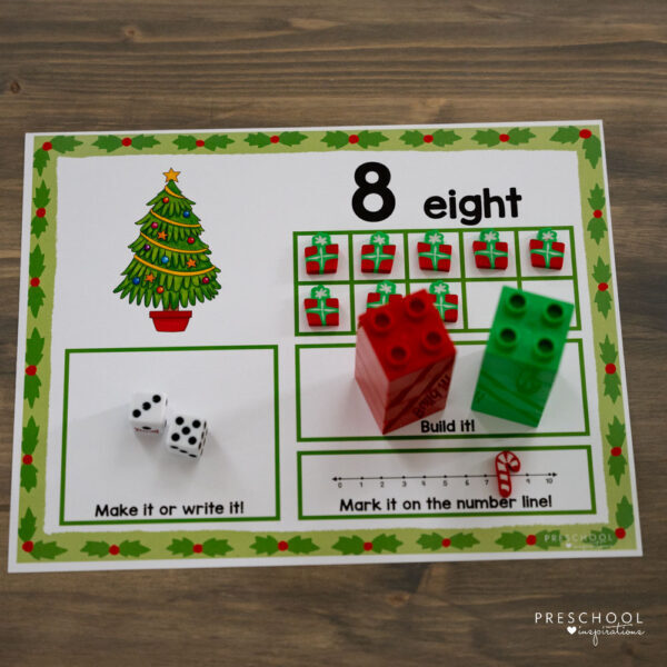 a christmas themed counting mat filled with manipulatives