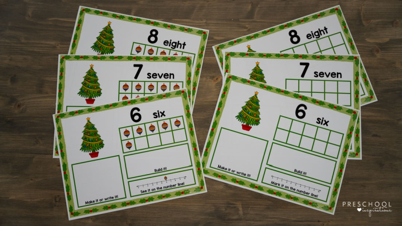 two sets of christmas counting mats, one with pre-filled items and one without